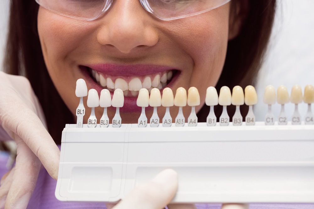 dentist testing veneers